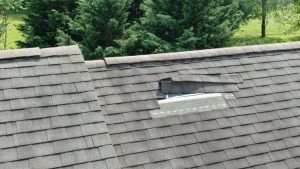 - Roof repair after storm damage in West Michigan