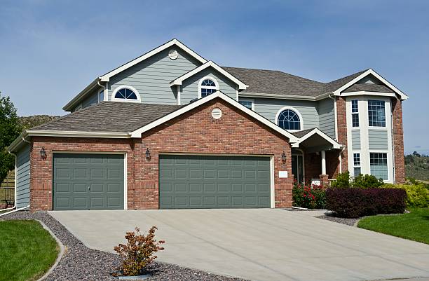 A Michigan home with a newly installed roof highlighting roof warranty coverage details.